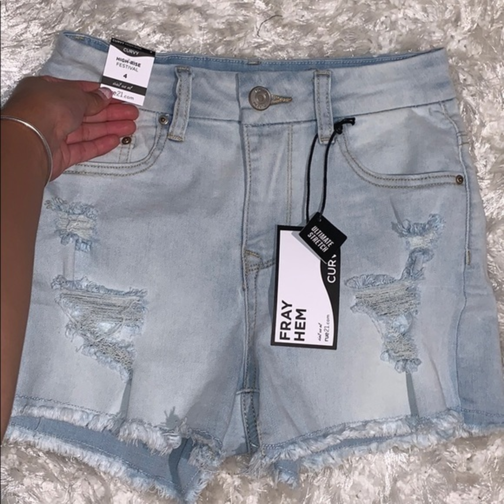 Ripped mom jeans high waisted